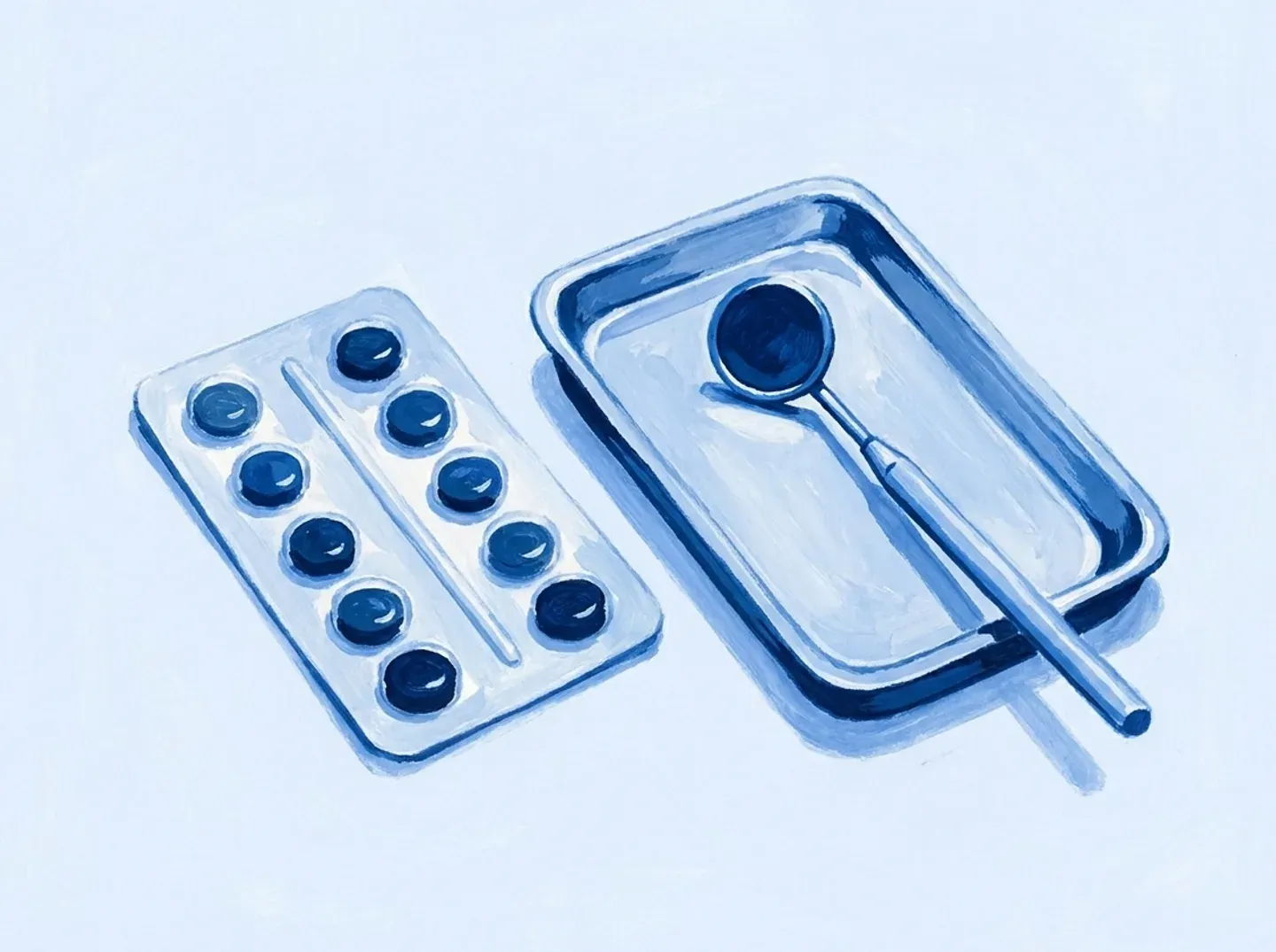 Un blíster de pastillas junto a una bandeja de exploración