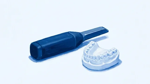 Un escáner intraoral y un modelo impreso, juntos sobre la mesa