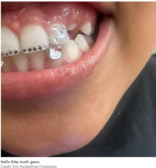 hello kitty tooth gems